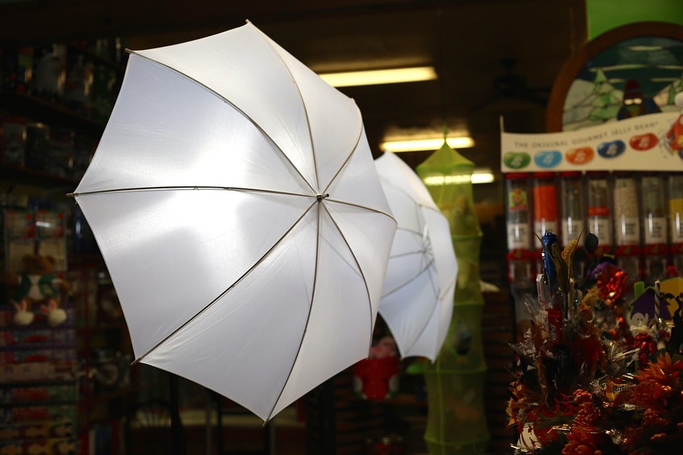 white umbrellas in a gray storm